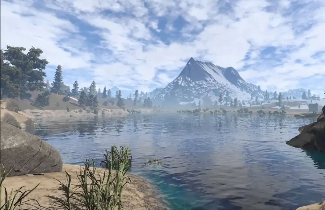 RUST alpine lake beneath a snow peak